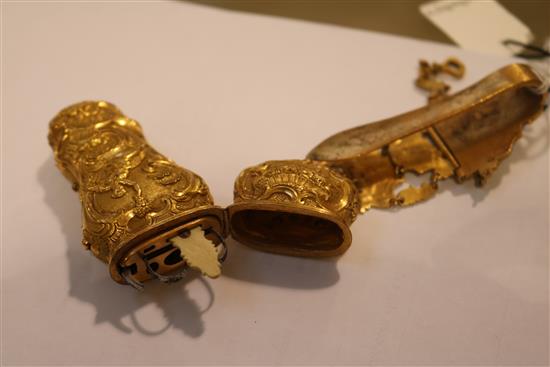 A group of three gilt metal etuis and a parcel gilt silver and ivory pendant notebook, cover various dates, largest 7.25in.